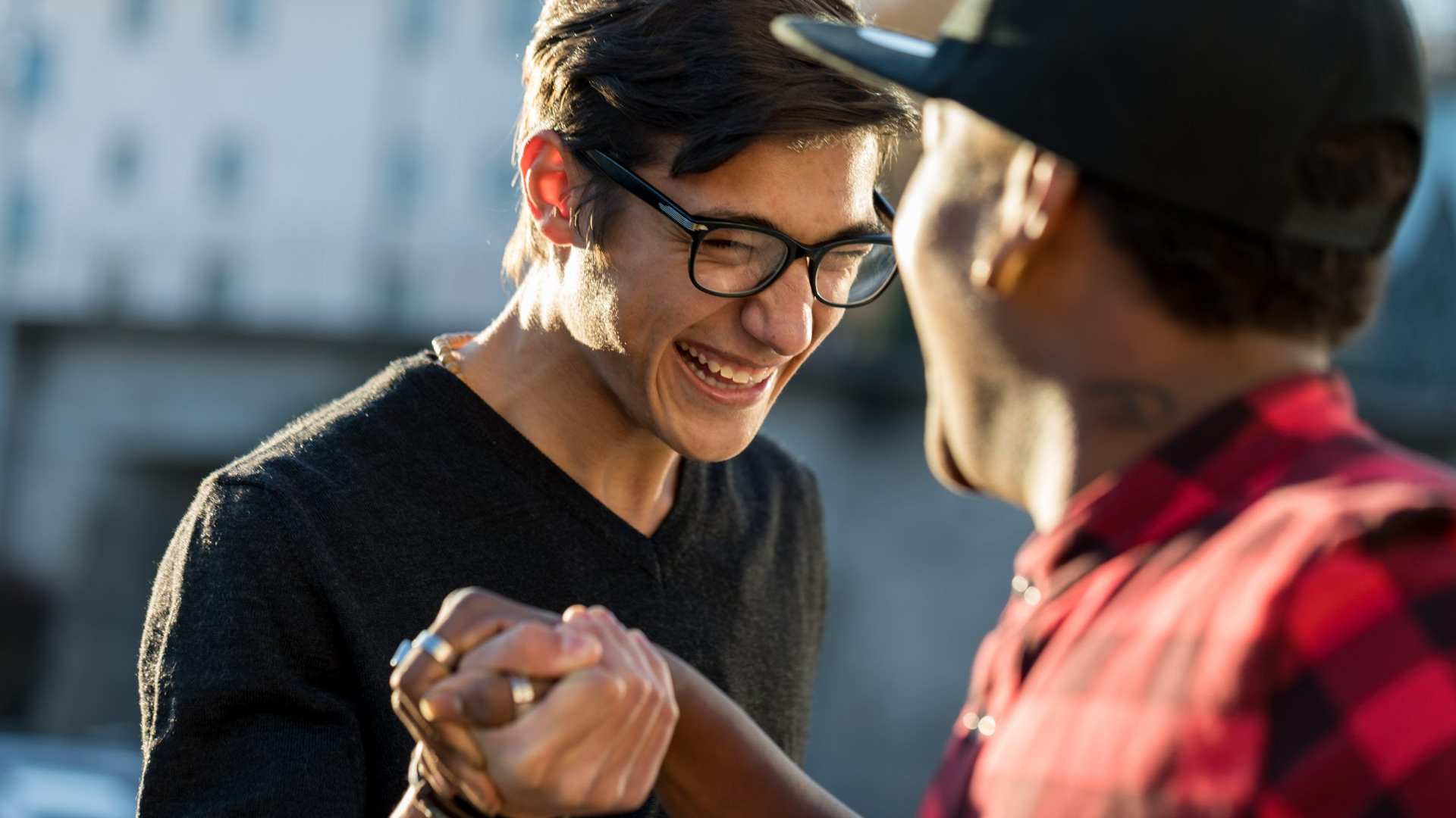 Teen shaking hands with a mentor Teen shaking hands with a mentor
