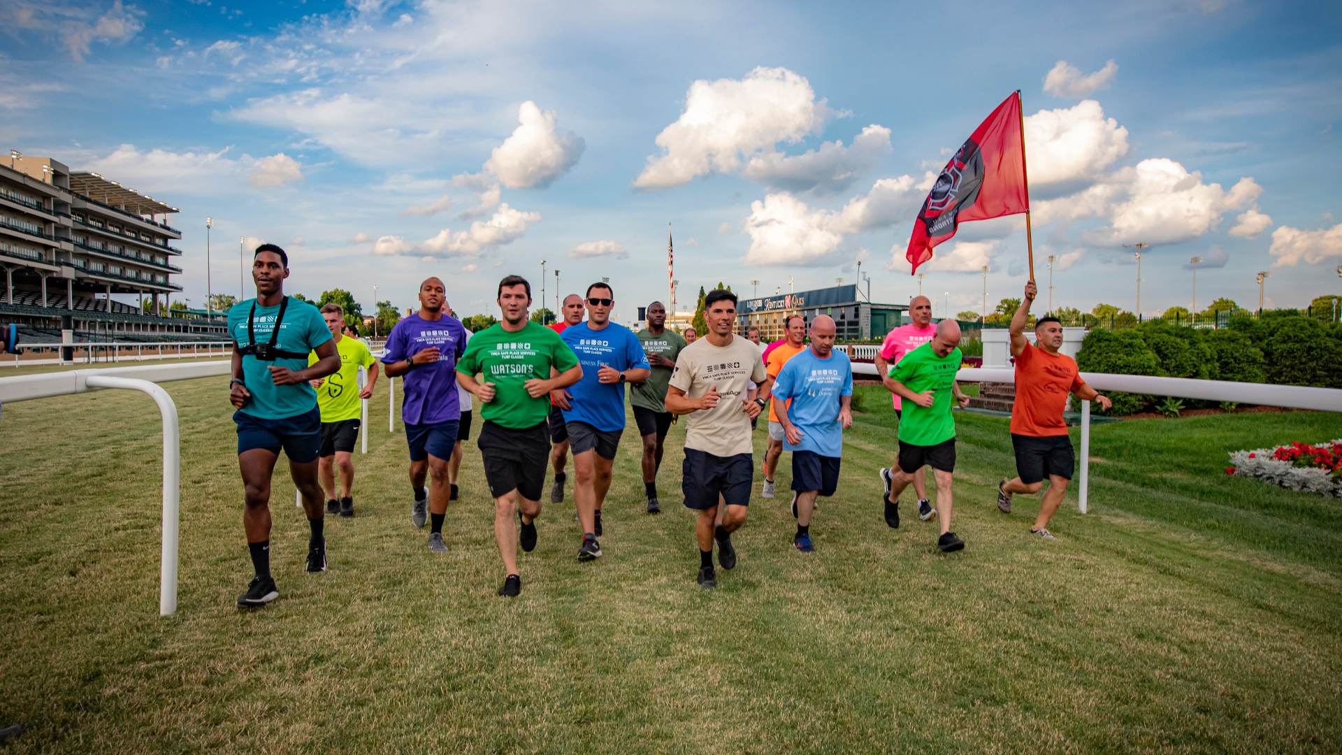 Local firefighters run at the YMCA Safe Place Services Turf Classic event Local firefighters run at the YMCA Safe Place Services Turf Classic event