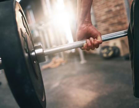 Man holding a weight bar Man holding a weight bar