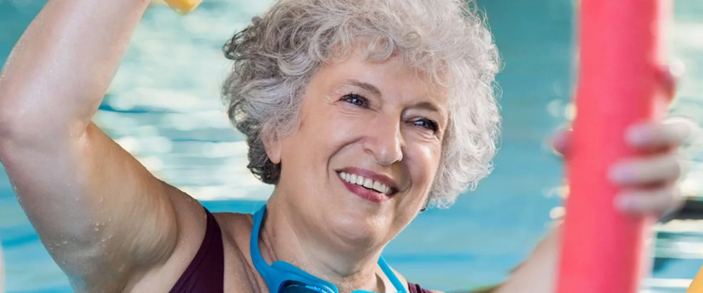 Woman enjoying an aqua fitness class at the YMCA