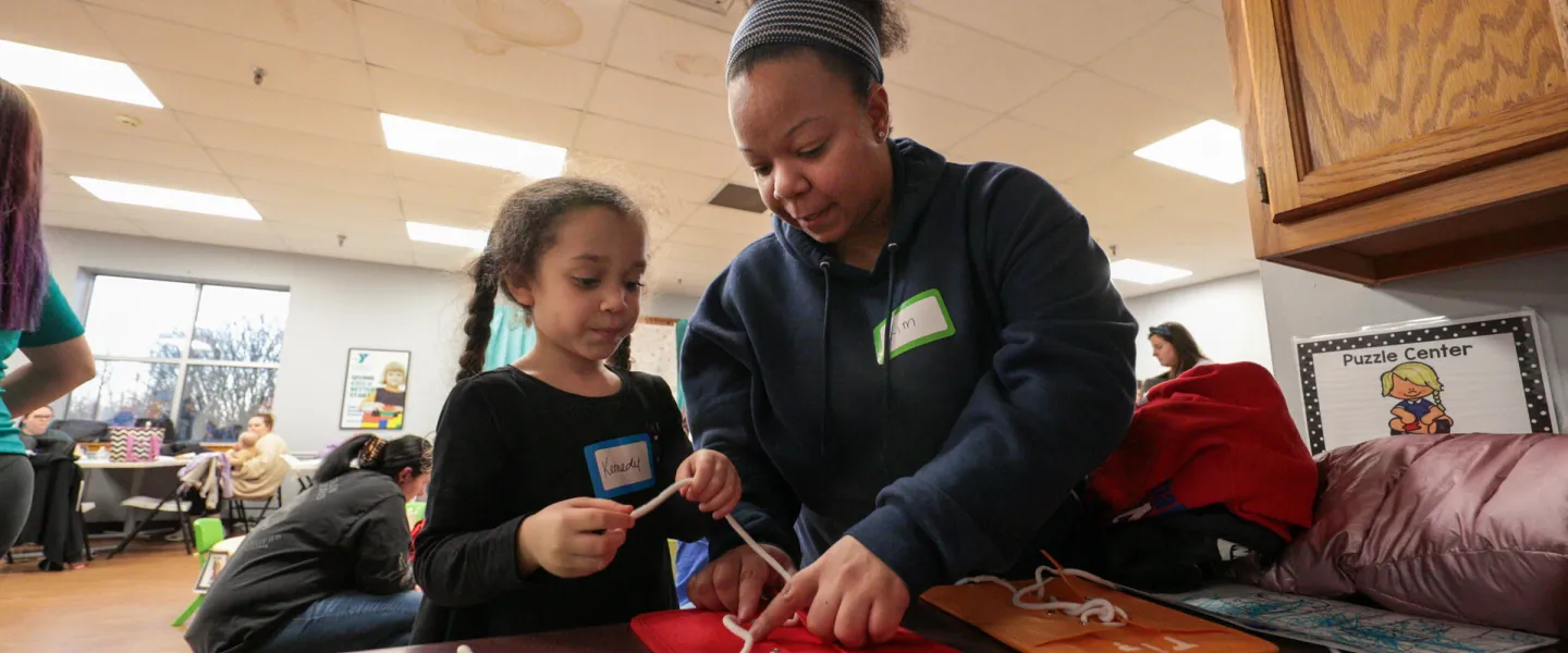 Child and parent at early learning readiness class