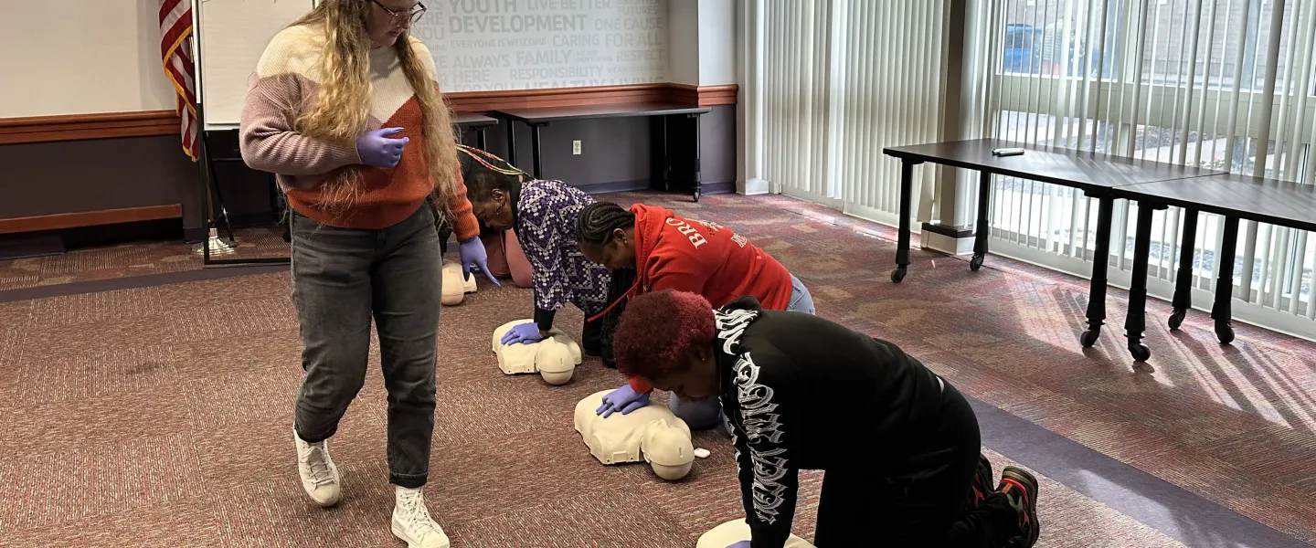Person teaching a CPR class