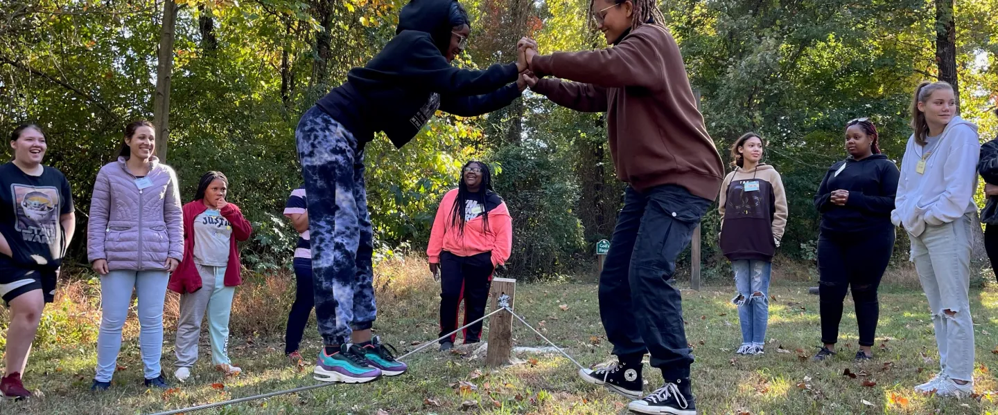 Group of teens playing games outside