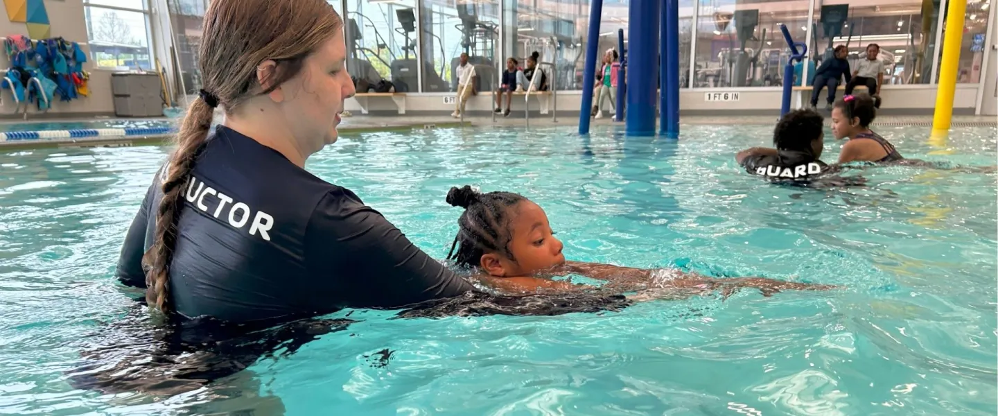 Safety Around Water instructor and child