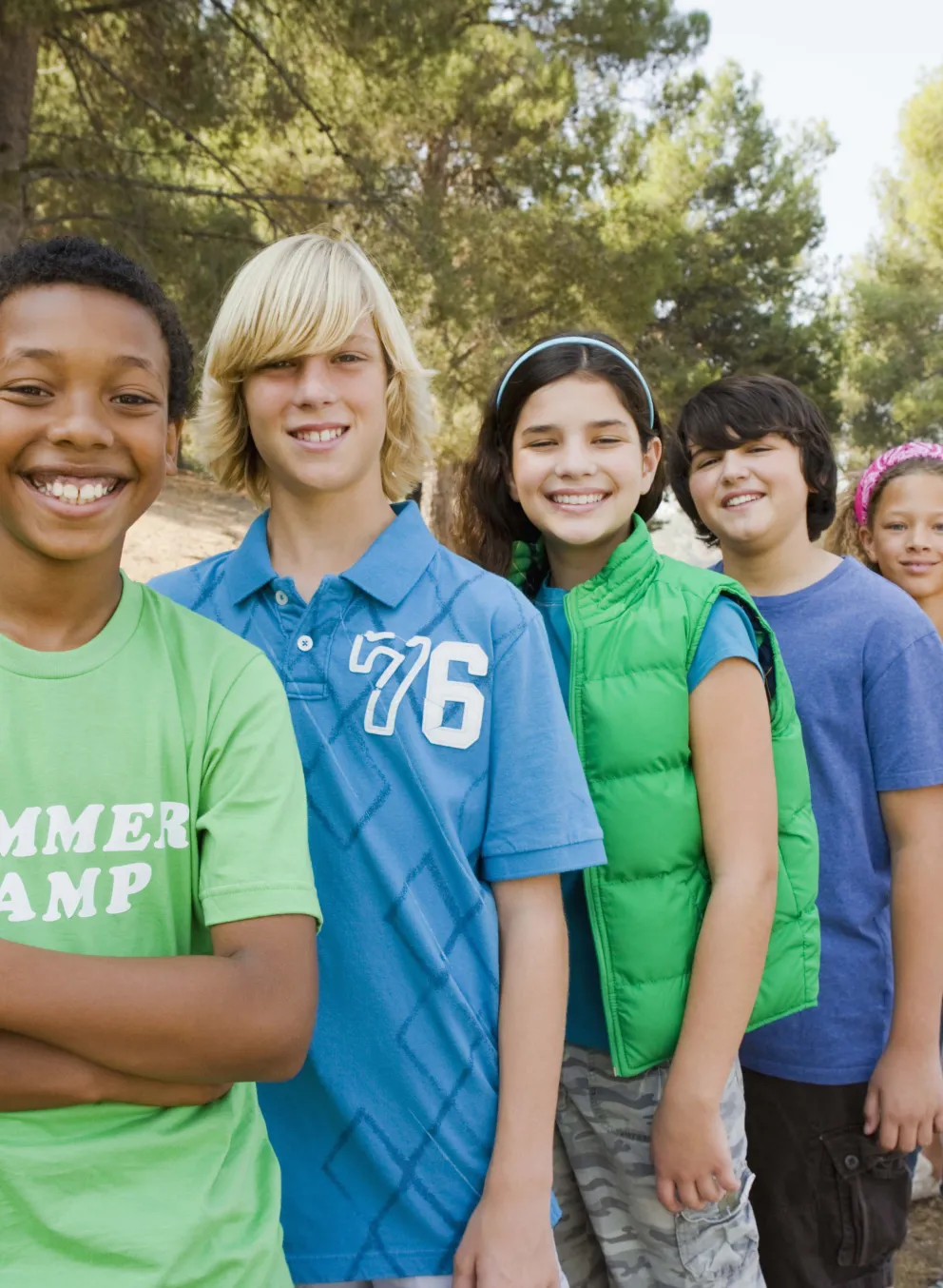 Group of teens standing next to each other