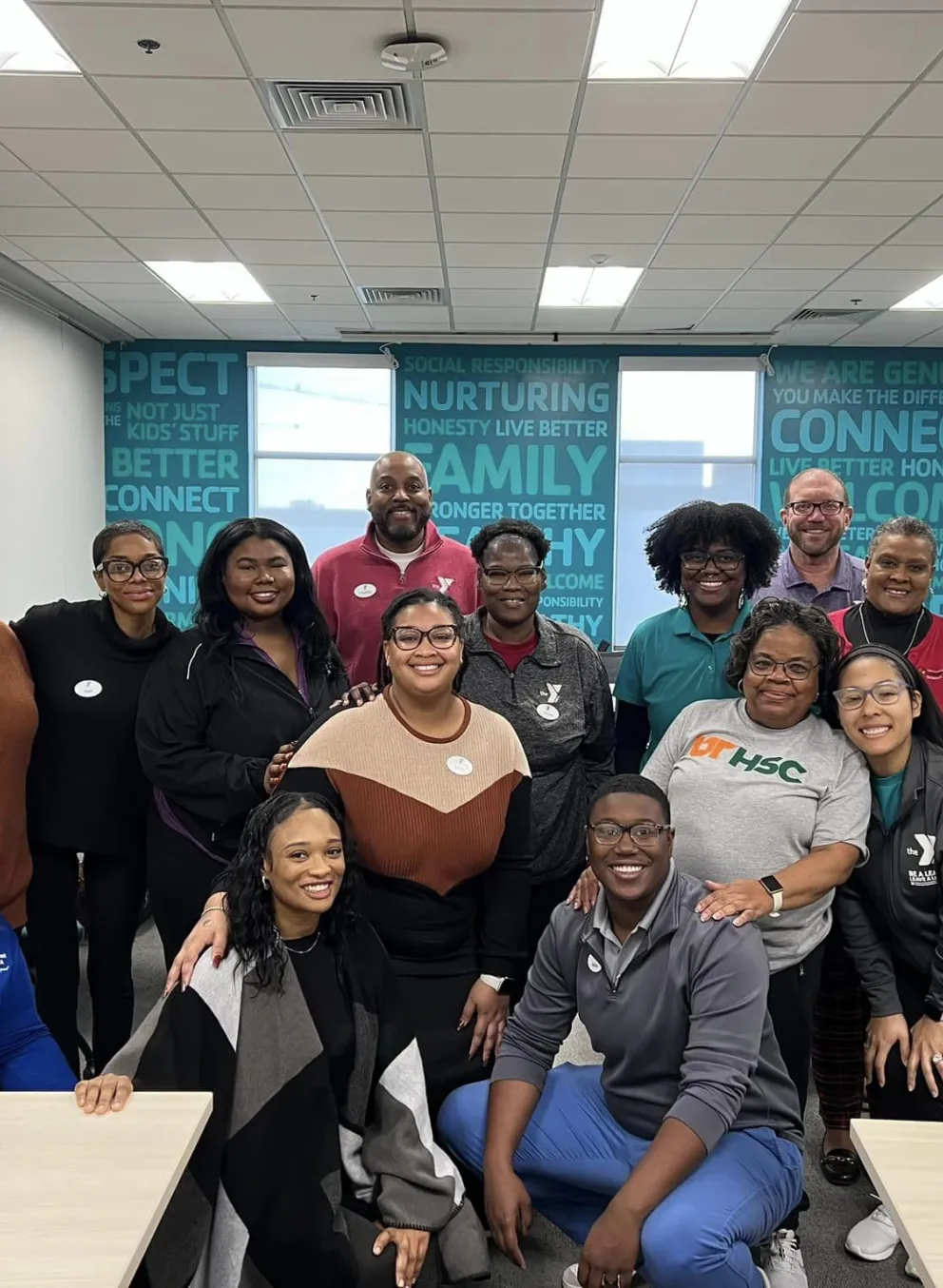 Group of adults sitting for photo