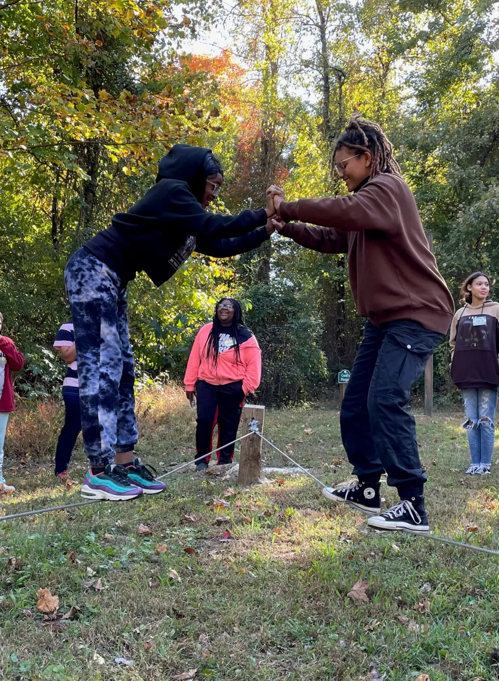 Group of teens playing games outside