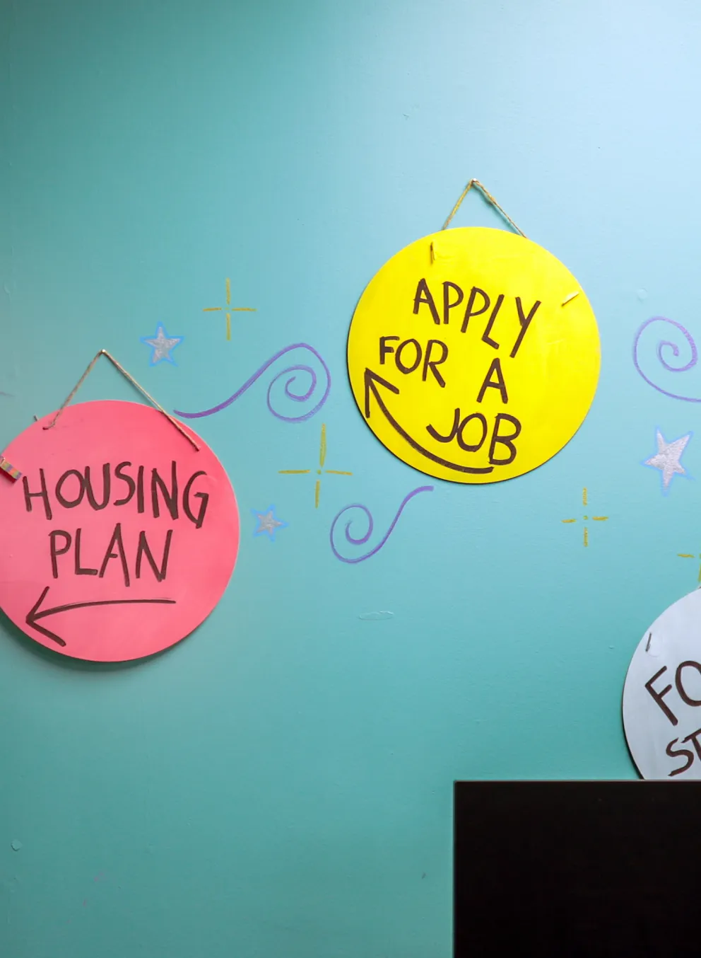 Arts and crafts hanging on a wall