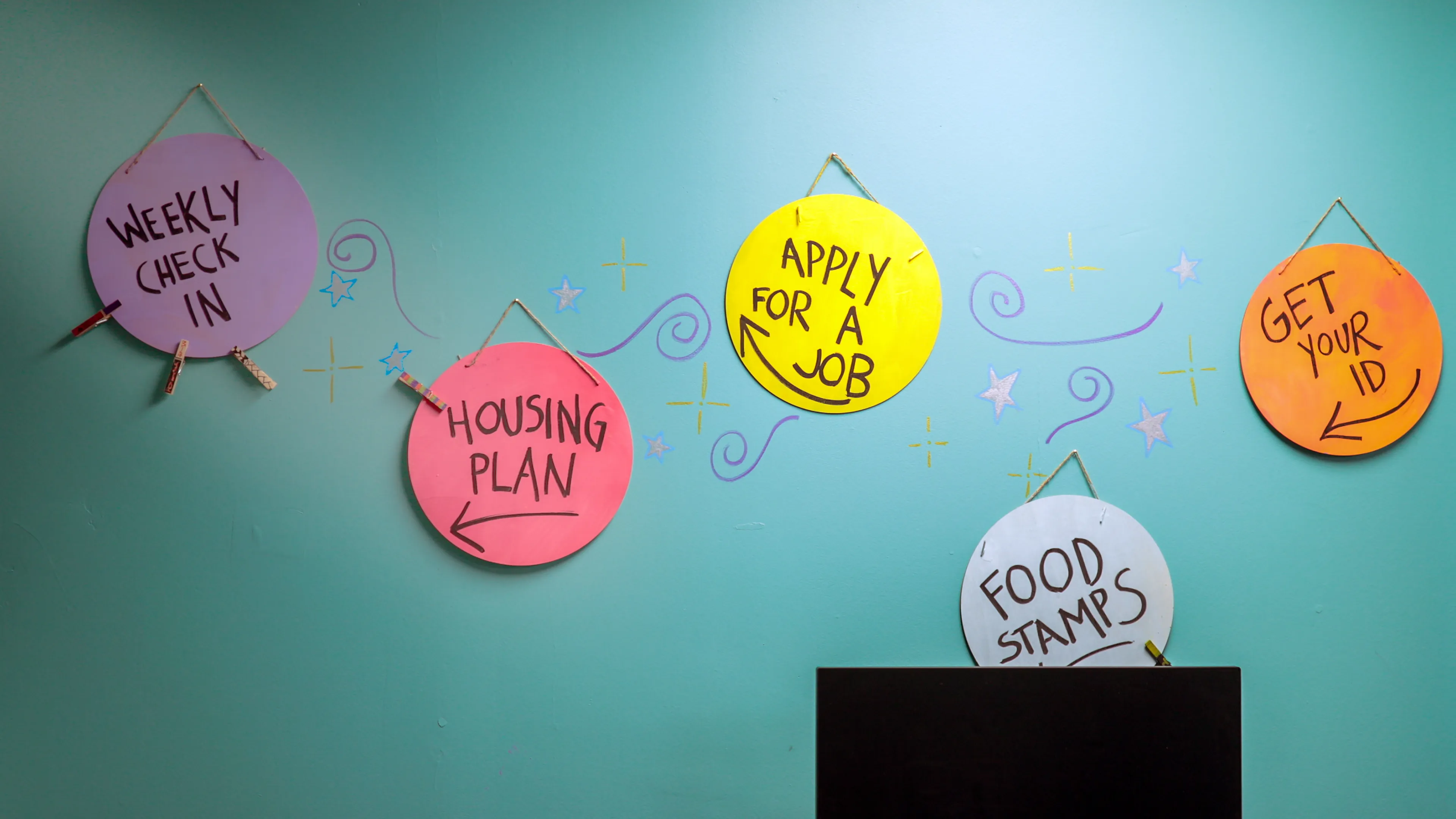 Arts and crafts hanging on a wall