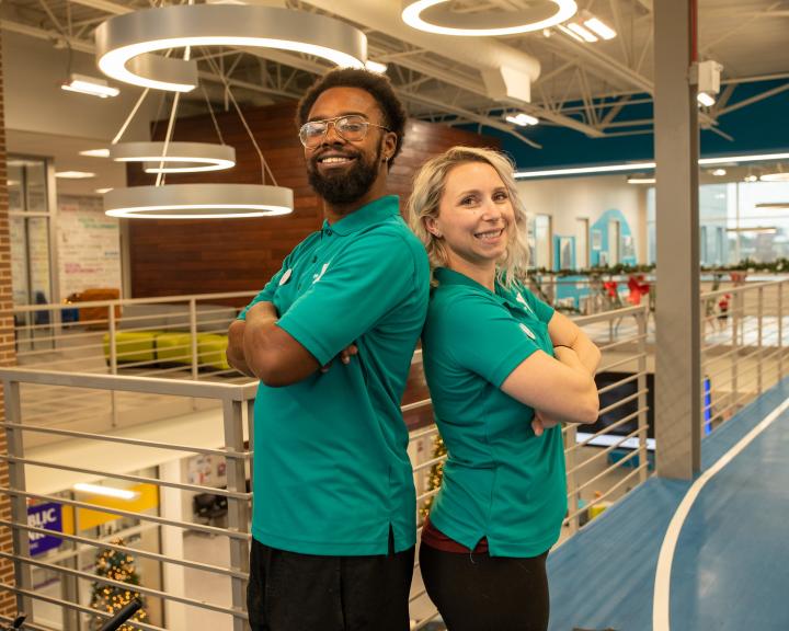 Two Y staff employees taking a photo together